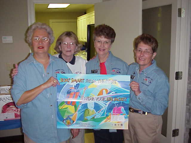 Pegy,Bonnie, Charlotte, Terry with poster.jpg (33625 bytes)